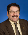 ALAN V. SURMAN